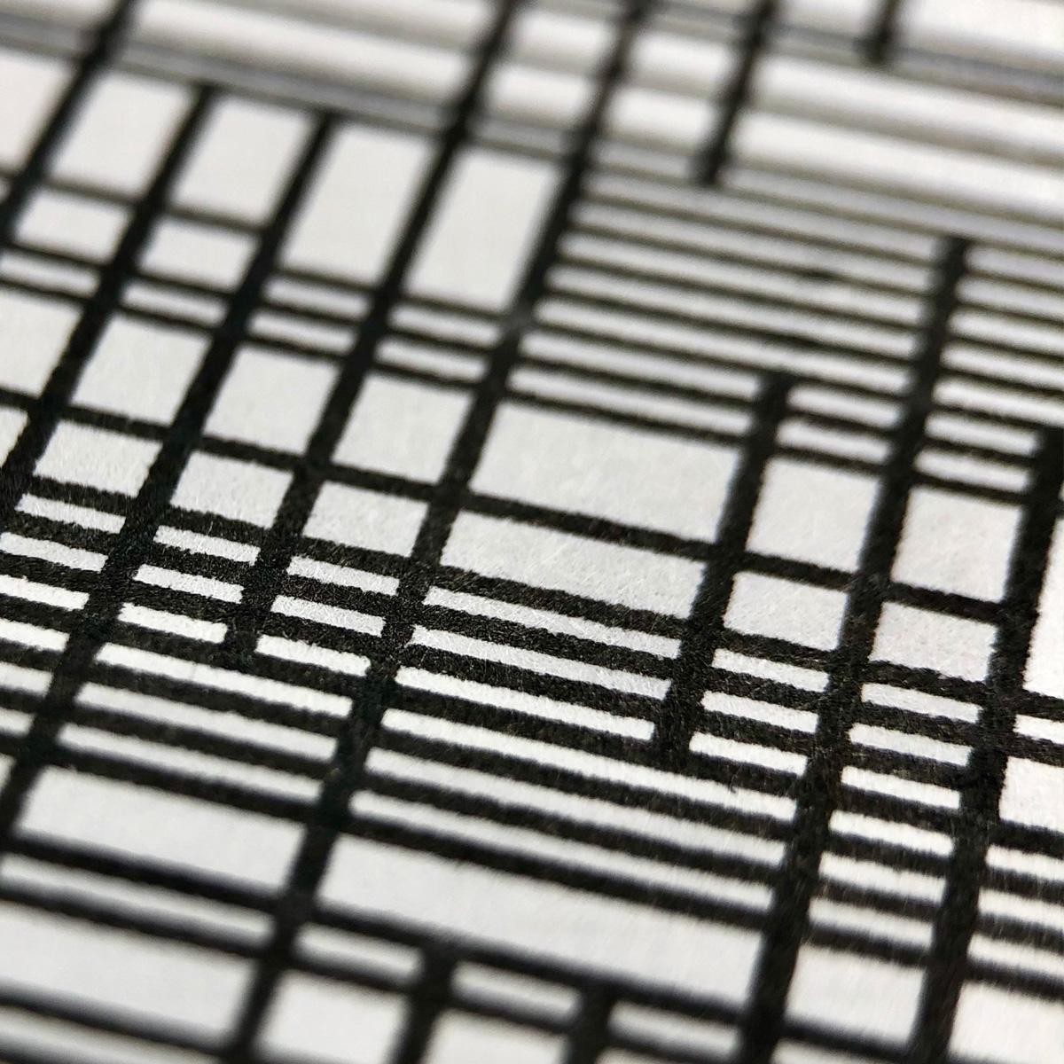 Closeup detail of a few of the grid items, showing how the ink interacts with the paper texture