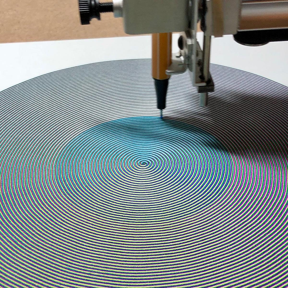 A printing-in-progress shot showing the fourth layer of colour being added