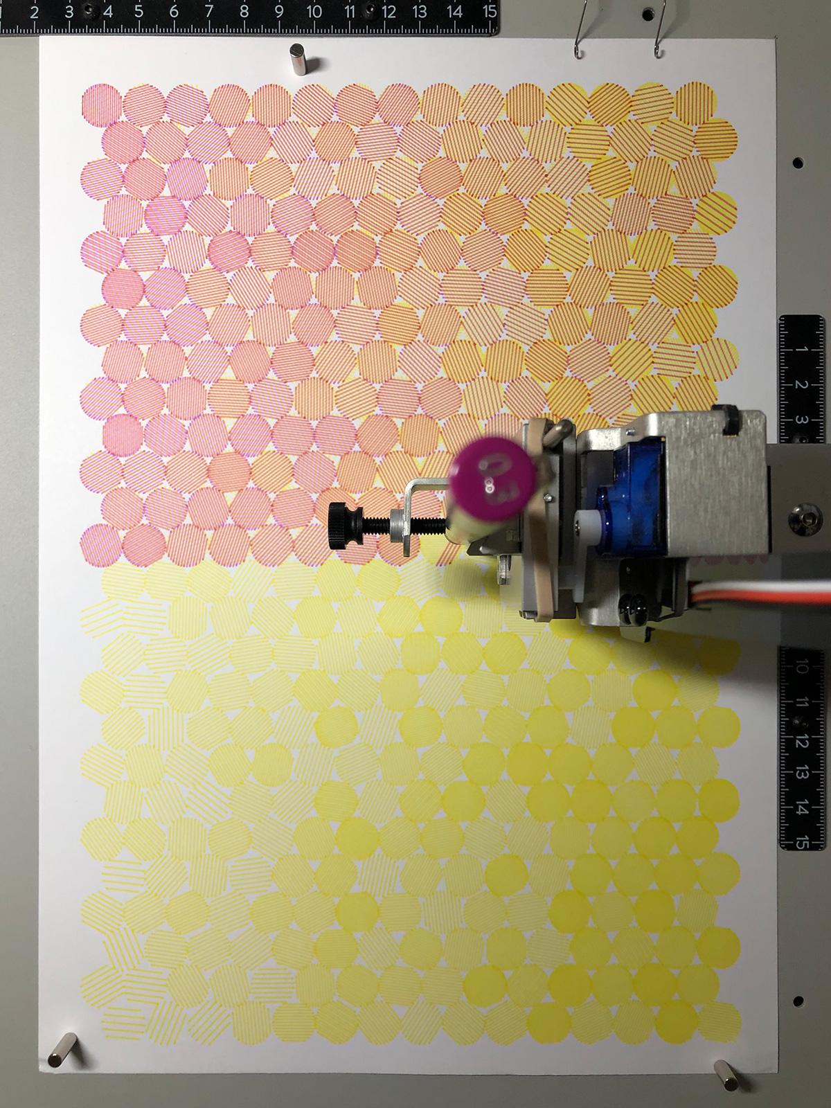 In-progress view shows magenta lines being drawn over the completed yellow layer
